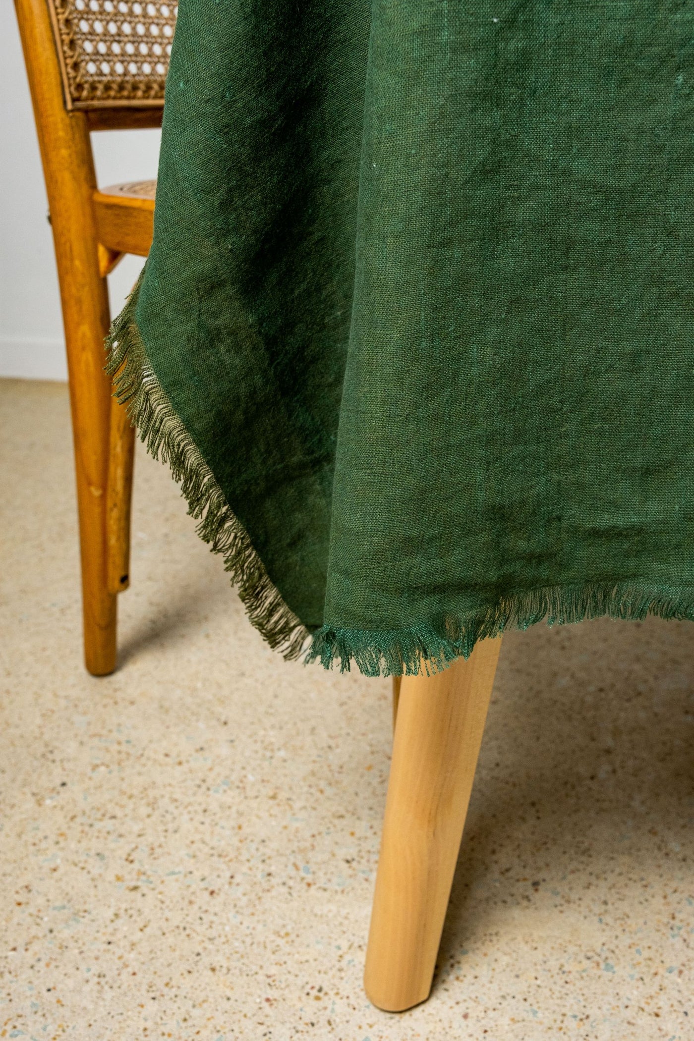 Moss green 100% linen tablecloth in frayed edges style